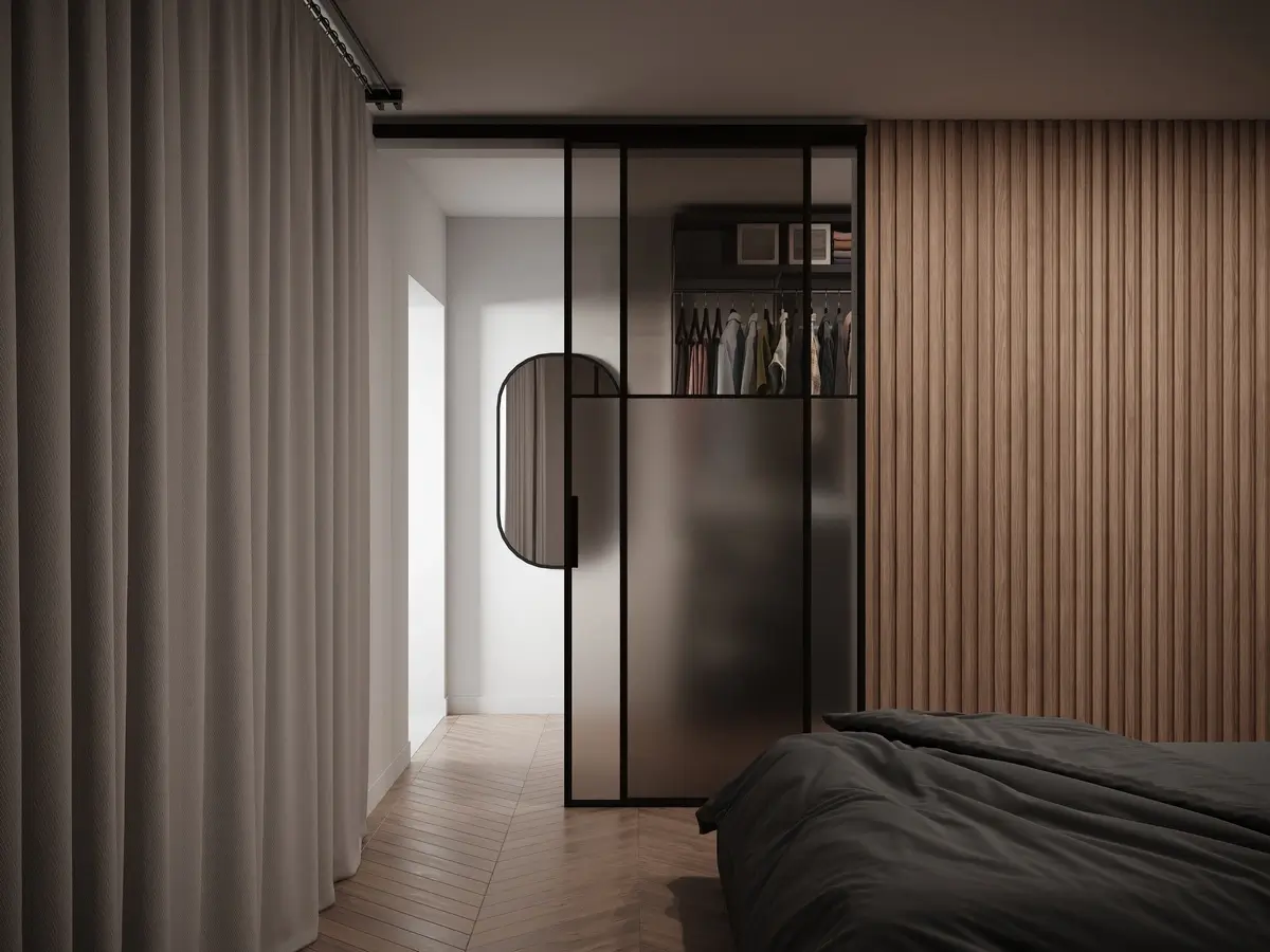 Алюминиевая двухстворчатая межкомнатная перегородка Grafia черного цвета с матовым стеклом на входе в гардеробную